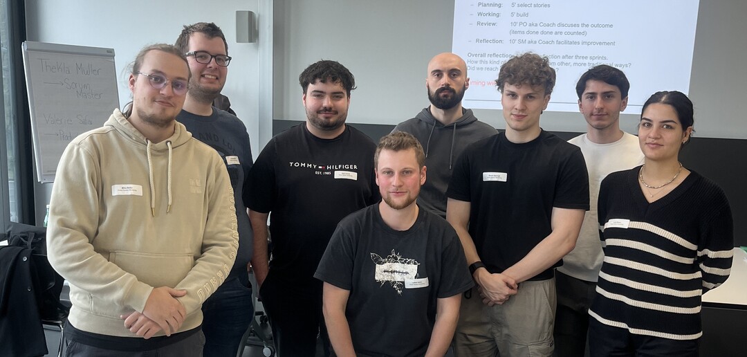 Group image of the Power System Monitoring-Team including all eight members, coach is not in the picture.