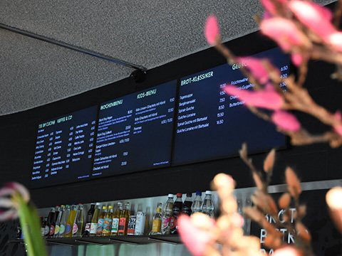 Three digital menu displays at Brot Bistro Bar