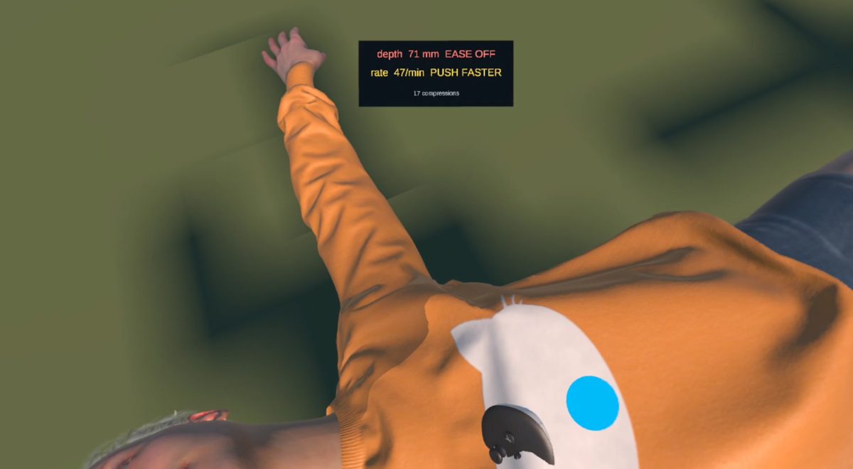 View of the virtual casualty during chest compressions with a panel showing compression depth and rate