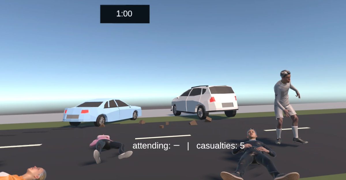 Start of the scenario: two damaged cars, five casualties on the road and a walking casualty